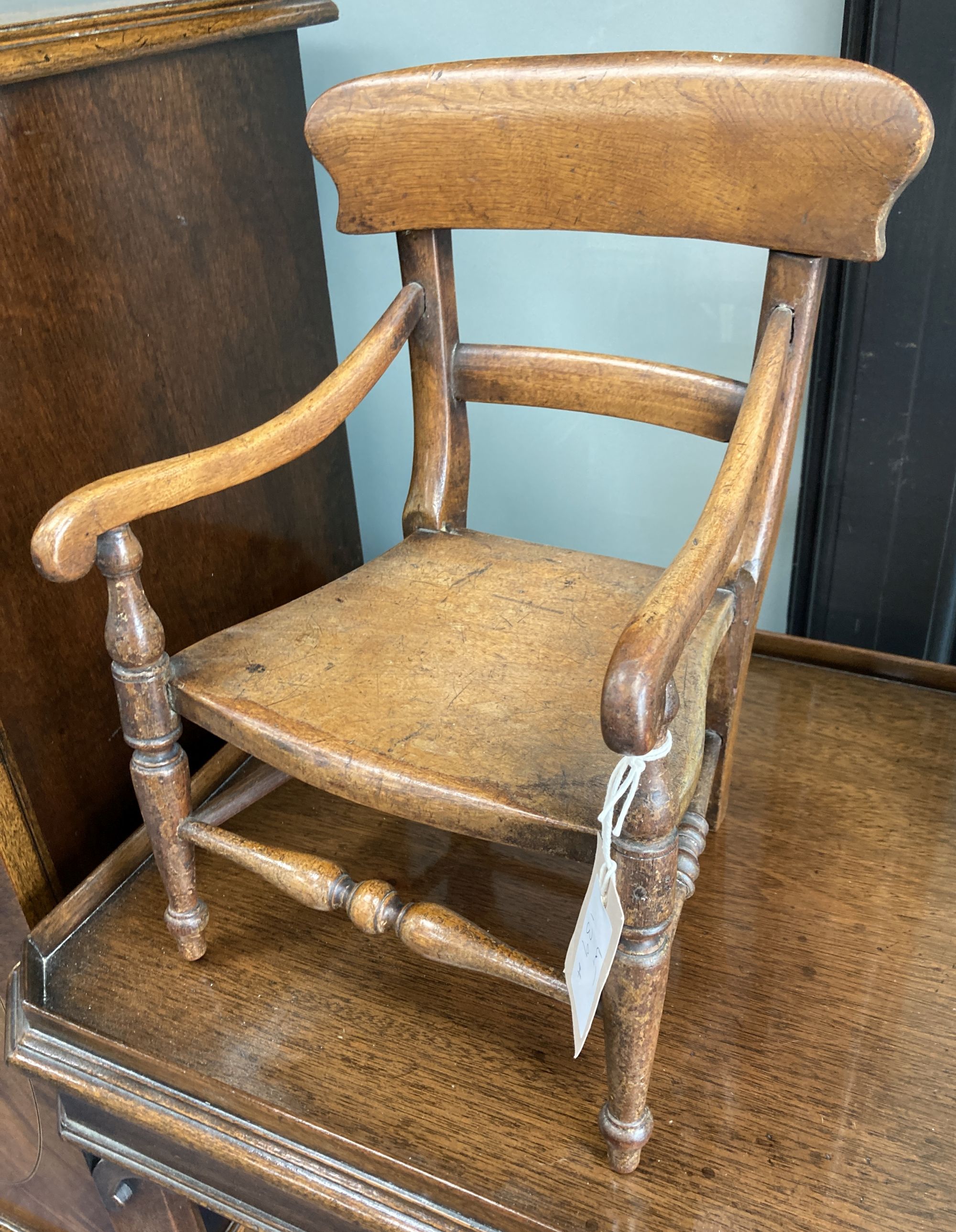 A Victorian mahogany apprentice elbow chair, width 26cm, depth 22cm, height 35cm
